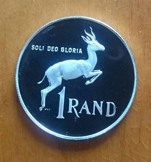 South Africa silver proof one rand in case. SOLI DEO GLORIA 1989.