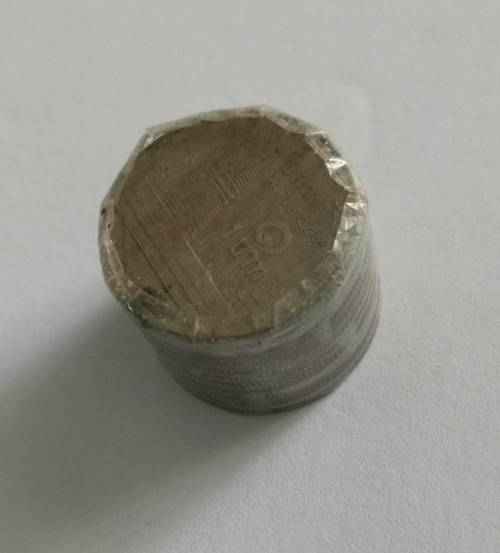 Collection of 10 UNC coins still in a sealed roll.