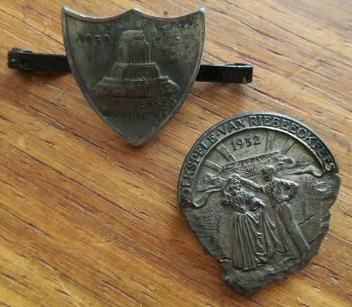 Voortrekker and van Riebeeck fees badges.