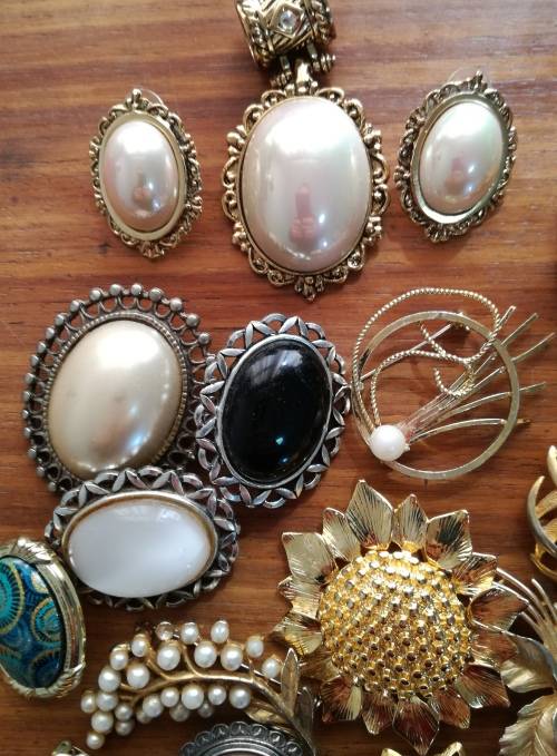 Large collection of vintage and costume jewelry. Some silver earrings.