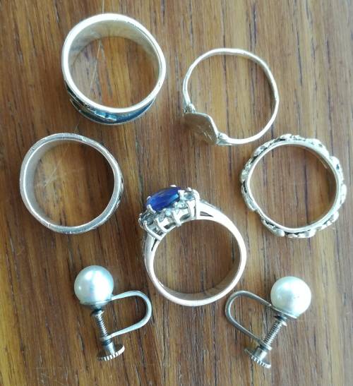 Collection of old silver rings and ear rings. Total weight is 24.77 grams.