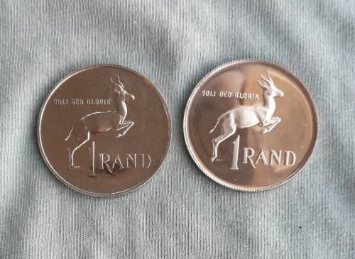 South Africa 1966 Afrikaans and 1968 English Silver One Rand coins.