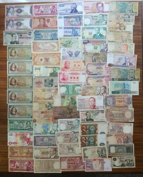 Collection of 68 old bank notes from around the world.