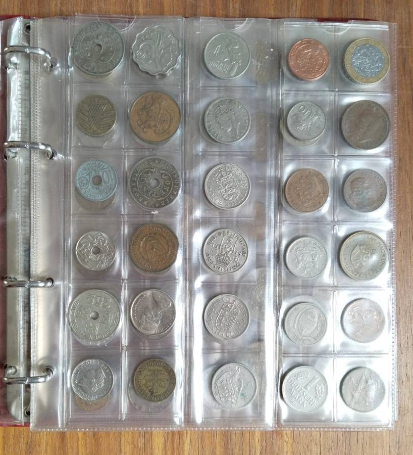Collection of 91 old coins with album. Nice collection.