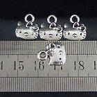 12 X Hello Kitty faces Tibetan silver charms - Sanrio