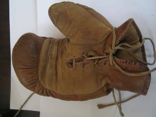 A RARE pair of Leather Gene Tunney Boxing Gloves made by A G Spalding & Bros circa 1920/30