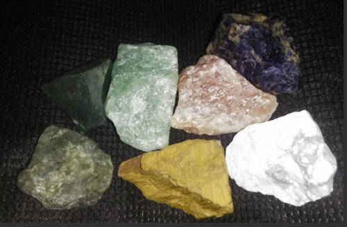 7 Large Rough Chakra Stones protect your well being.