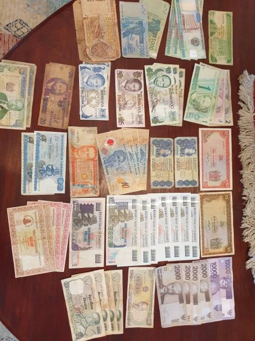 A large collection of banknotes.