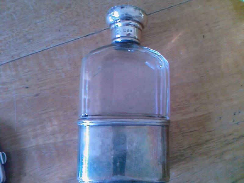 Crystal vanity bottle with hallmarked lid