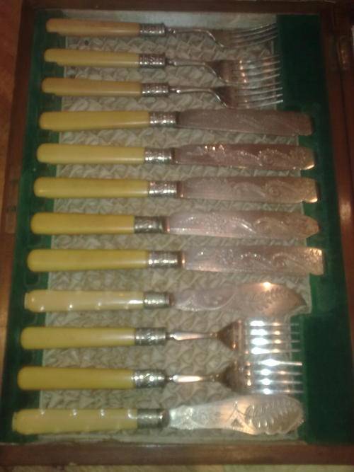 Decorative knife and fork set with ivory handles