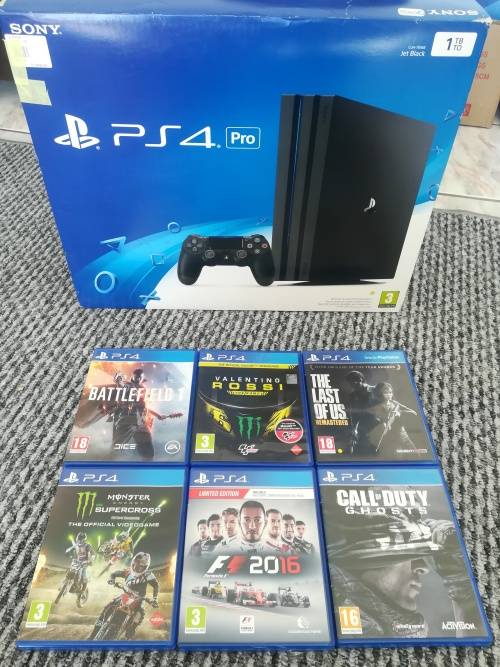 PS4 PRO 1TB CONSOLE + 1 CONTROLLER + 6 GAMES (LIKE NEW)