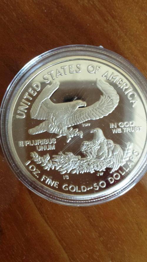 1 oz. 999 FINE GOLD plated USA 50 dollar coin - sealed in capsule: Statue of Liberty.