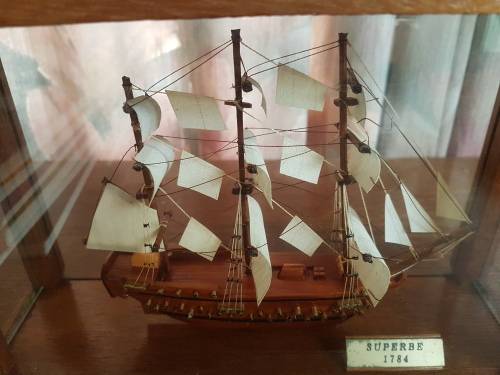 sailing ship in glass case