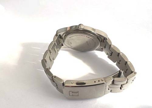TITANIUM TISSOT PR 50 MEN'S WATCH, WITH DATE, IN GOOD CONDITIONS
