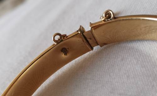 Vintage Gold color Engraved Bangle, can't make out the stamp inside its 9...and T as per pics.