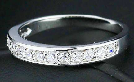 Sparkling 0.24 Carat Cr. Diamond Half Eternity Band. Size 8/Q
