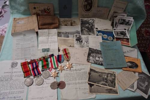 Set of WW2 Medals awarded to 108183 C.V. Smith and Lots of War Memorabilia Included