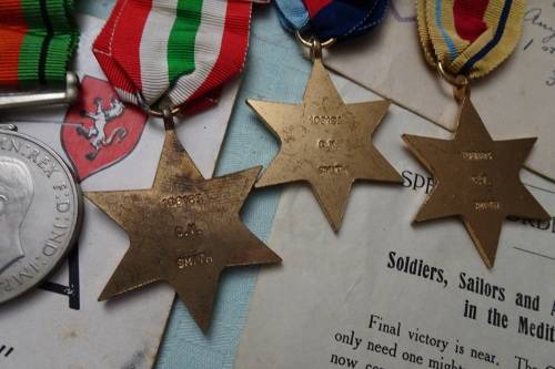 Set of WW2 Medals awarded to 108183 C.V. Smith and Lots of War Memorabilia Included