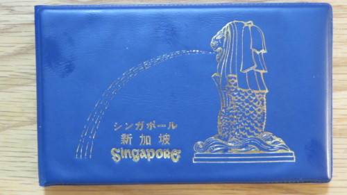 Singapore and Malaysia Uncirculated Coin and Stamp Set in Plastic Wallet Details in Description