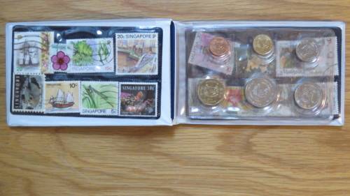 Singapore and Malaysia Uncirculated Coin and Stamp Set in Plastic Wallet Details in Description