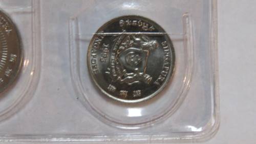 Singapore and Malaysia Uncirculated Coin and Stamp Set in Plastic Wallet Details in Description