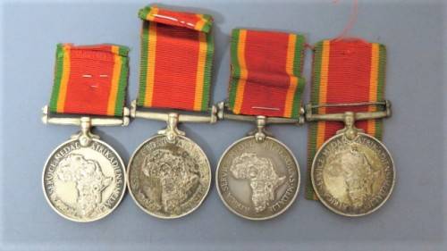 Four WW II Silver Africa Service Medals Issued to Various People Details in Description 136.9 g