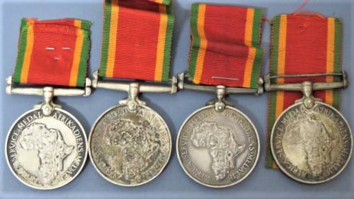Four WW II Silver Africa Service Medals Issued to Various People Details in Description 136.9 g