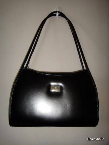 Black Gucci bag.