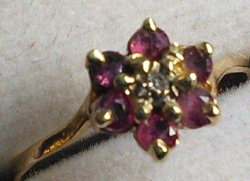 Genuine Ruby  and Diamond ring in 9ct Gold