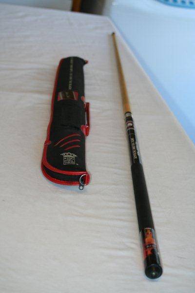 An AWESOME Black Label branded pool cue and storage bag!!
