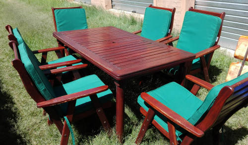 WOODEN PATIO TABLE AND CHAIRS.