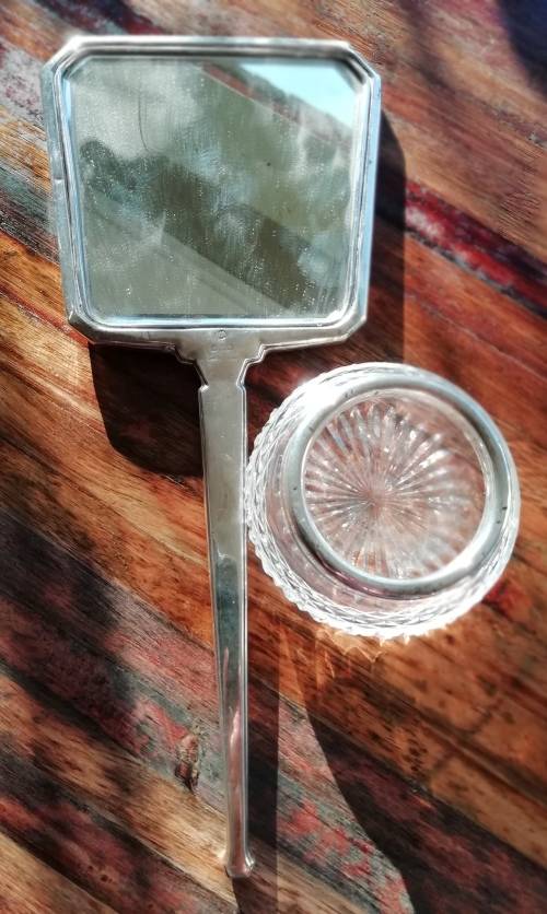 SILVER MIRROR AND CHRYSTEL GLASS CONTAINER WITH SILVER RIM.