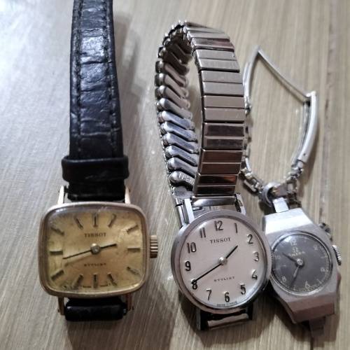 THREE LADIES WATCHES.  OMEGA AND TISSOT.