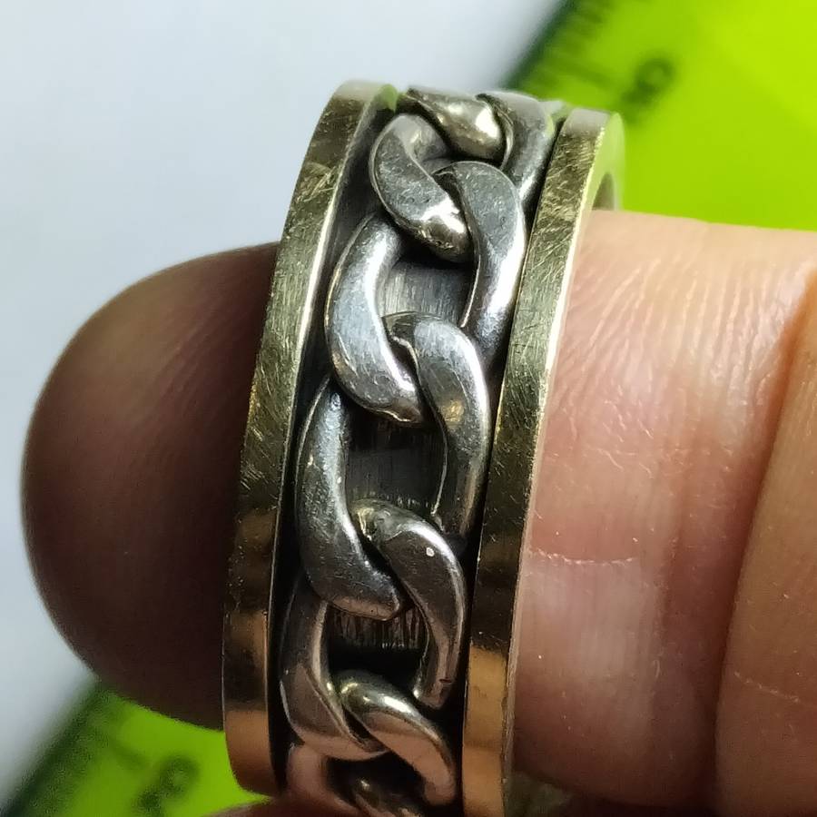 MEN`S SILVER AND 9ct GOLD RING.