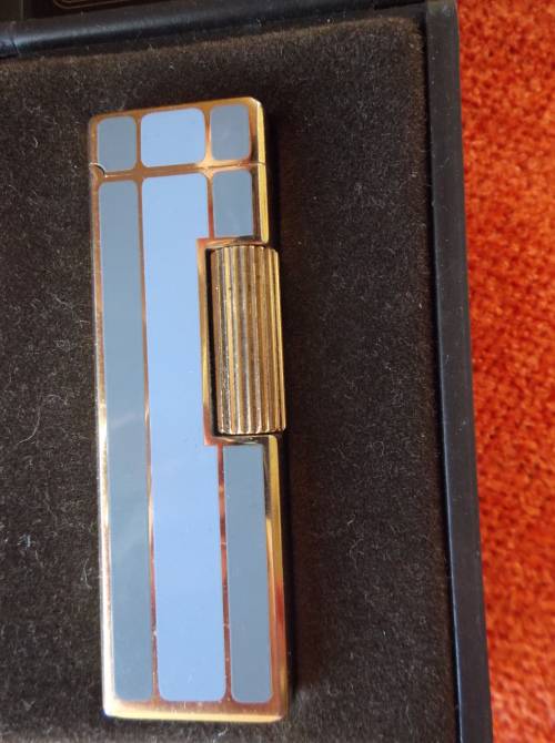 Stunning WIN Lighter in box.