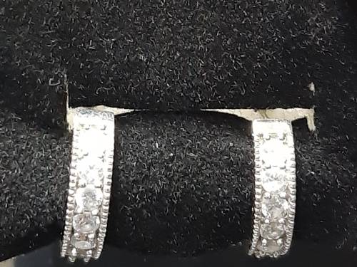 Sterling silver huggies with zirconias