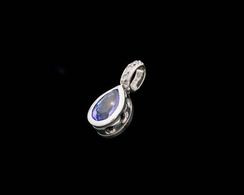 1.9 grams 14 carat White Gold Tanzanite and Diamond Pendant
