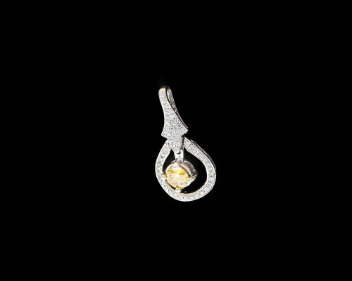 1.4 grams 18 carat White Gold and Fancy Yellow Diamond Pendant