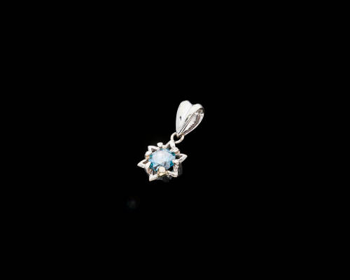 1.4 grams 18 carat White Gold Blue Diamond Pendant