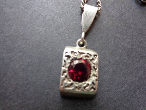 UNMARKED CHAIN WITH PENDANTSEE SCANS READ ON