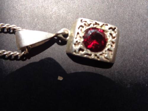 UNMARKED CHAIN WITH PENDANTSEE SCANS READ ON