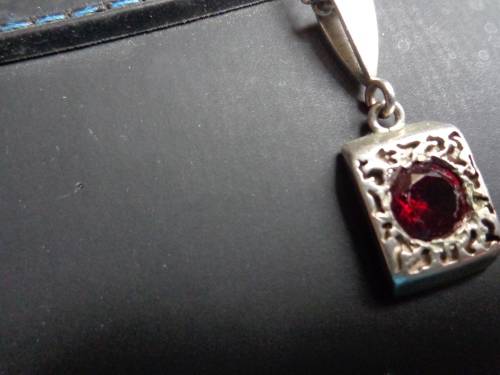 UNMARKED CHAIN WITH PENDANTSEE SCANS READ ON