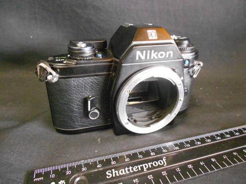 Nikon EM camera with auto timer, no lens - as per scan
