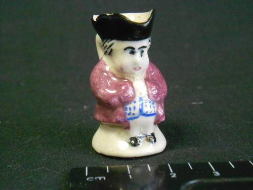 Miniature toby jug by devon moore, cracked and chipped in neck - as per scan