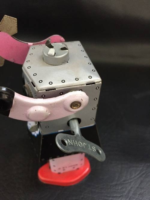 Tin metal wind up robots working bid for both!!!!