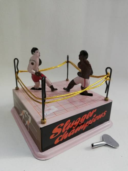 Rare mint condition Sluggers champion tin toy with key winds up working!!!!!!