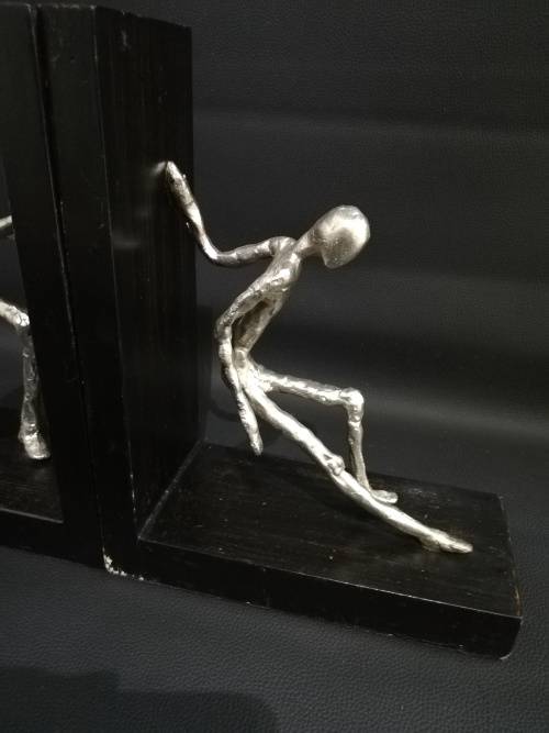 Two large metal Bookends bid for both!!!!
