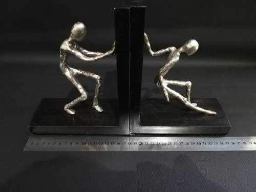 Two large metal Bookends bid for both!!!!