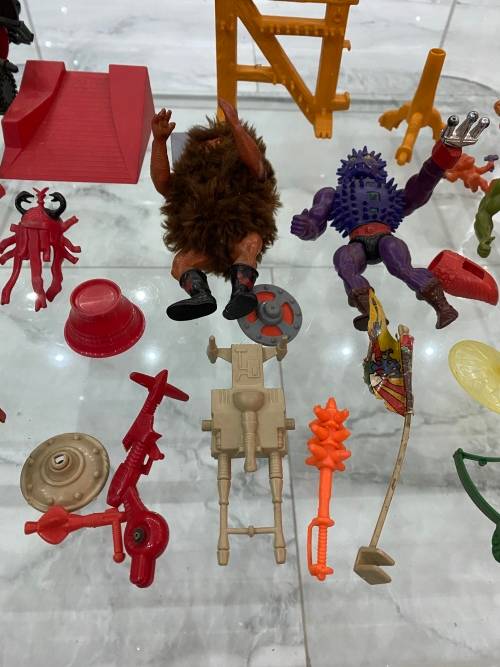LARGE COLLECTION OF MASTER OF THE UNIVERSE ACTION FIGURES AND SPARES WITH WEAPONS BID FORL ALL!!