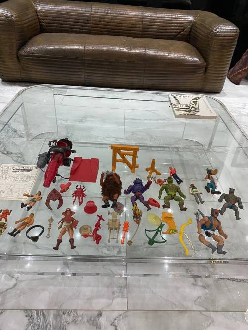LARGE COLLECTION OF MASTER OF THE UNIVERSE ACTION FIGURES AND SPARES WITH WEAPONS BID FORL ALL!!